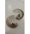 Artistic earrings with sandblasting technique.